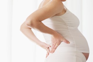 Боль в пояснице при беременности на ранних сроках